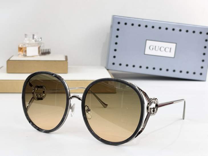 Picture of Gucci Sunglasses _SKUfw79721622fw